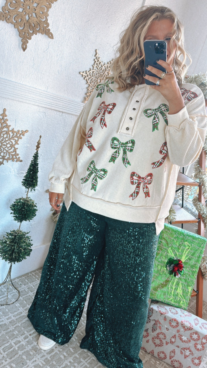 Full Of Cheer Sequin Bow Long Sleeve Top