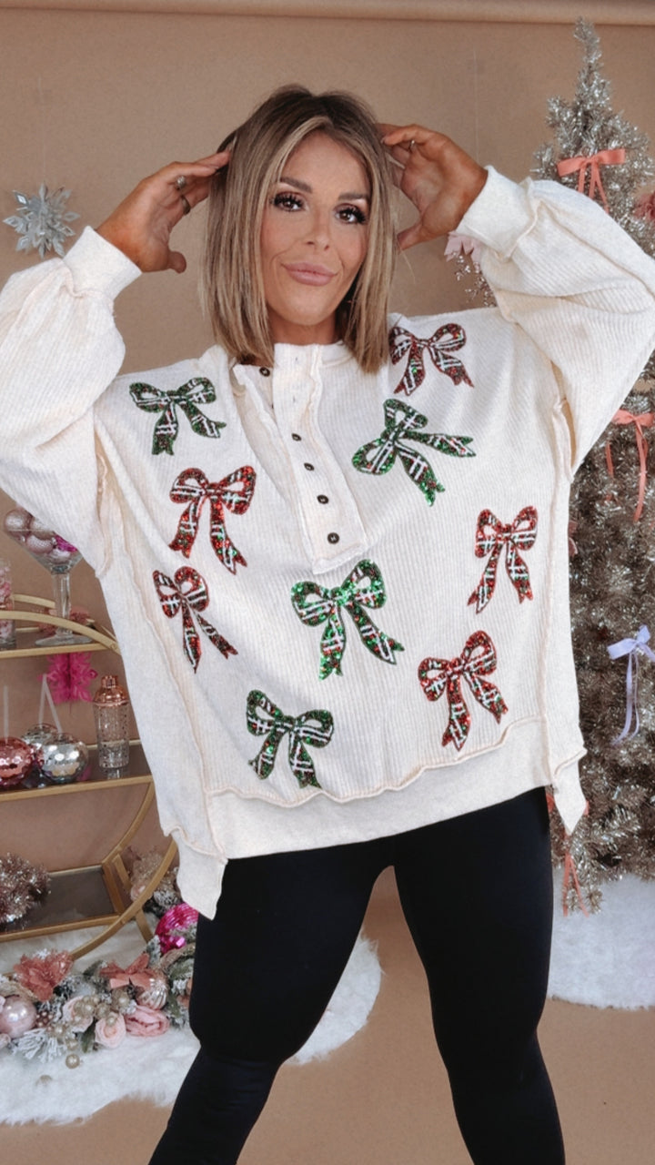 Full Of Cheer Sequin Bow Long Sleeve Top